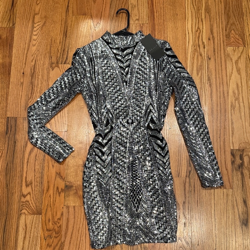 NEW YEARS EVE DRESS 
NWT AKIRA Black and Silver Geometric Long Sleeve Dress